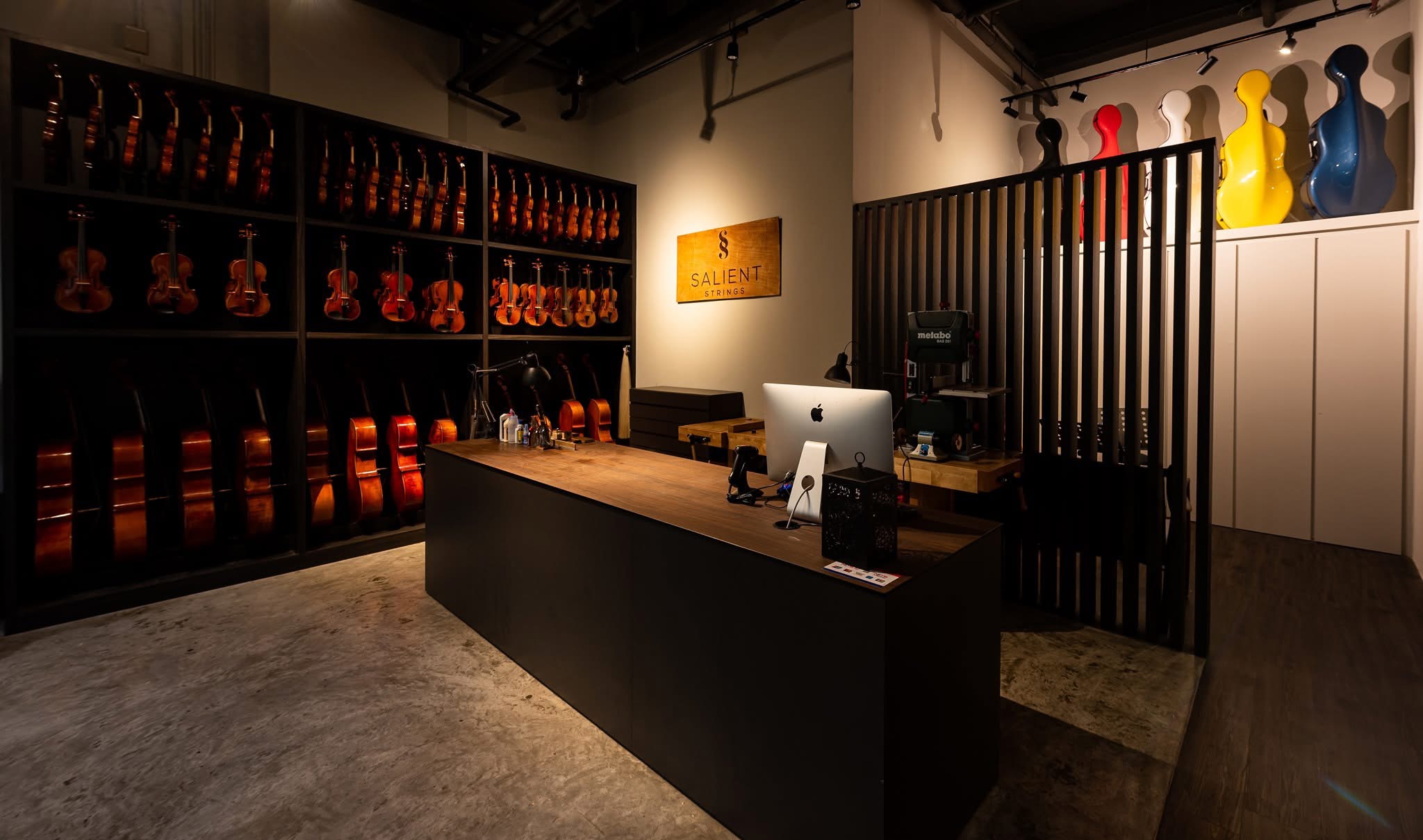 Inside the Salient Strings gallery and workshop, with violins and cellos on display